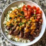Photo of featured for Savor the Flavor: Irresistible Steak Queso Rice for Your Next Meal